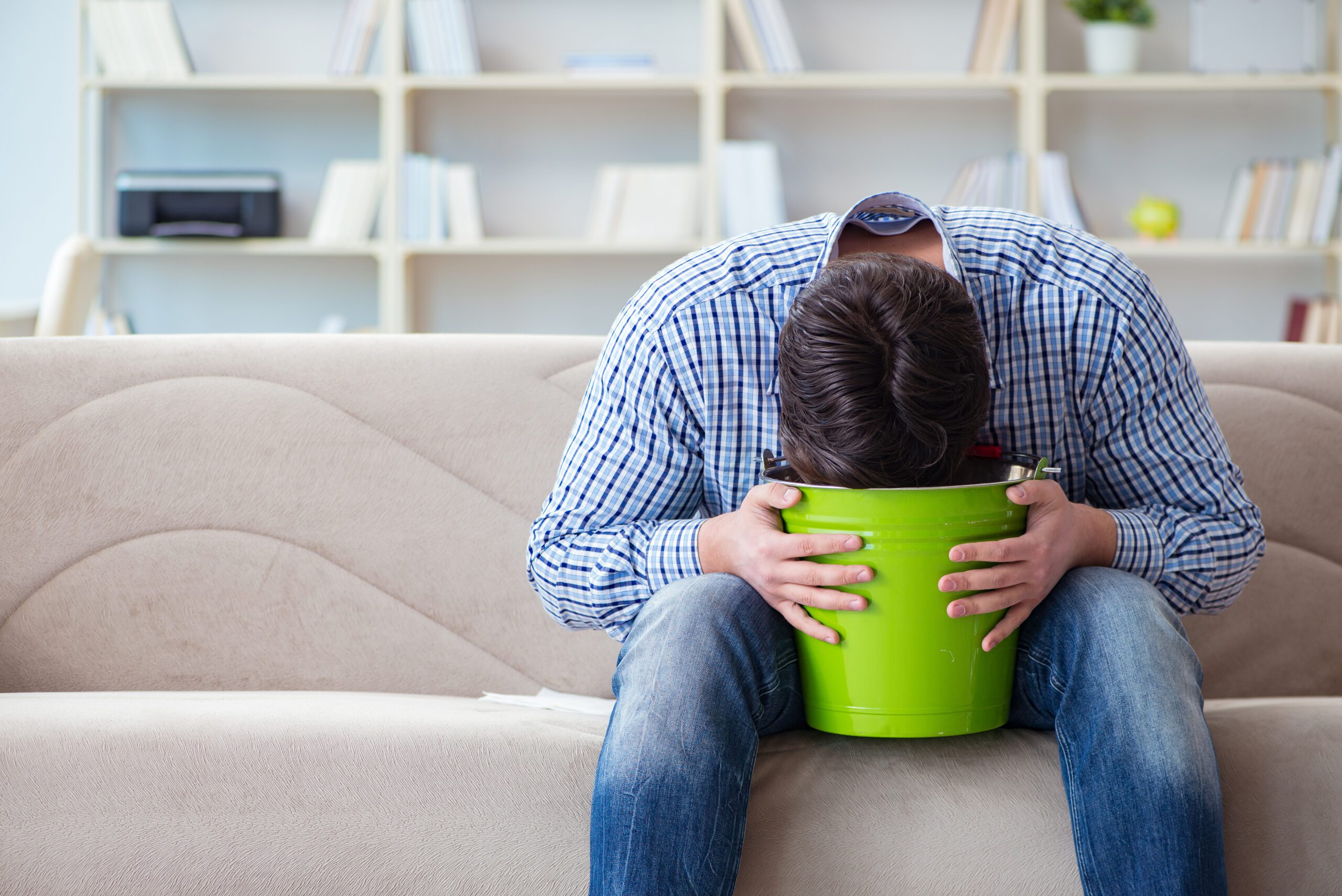 Man suffering from sick stomach and vomiting